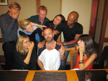 Hugo comforted by friends.